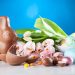 white flowers between brown rabbit figure and eggs