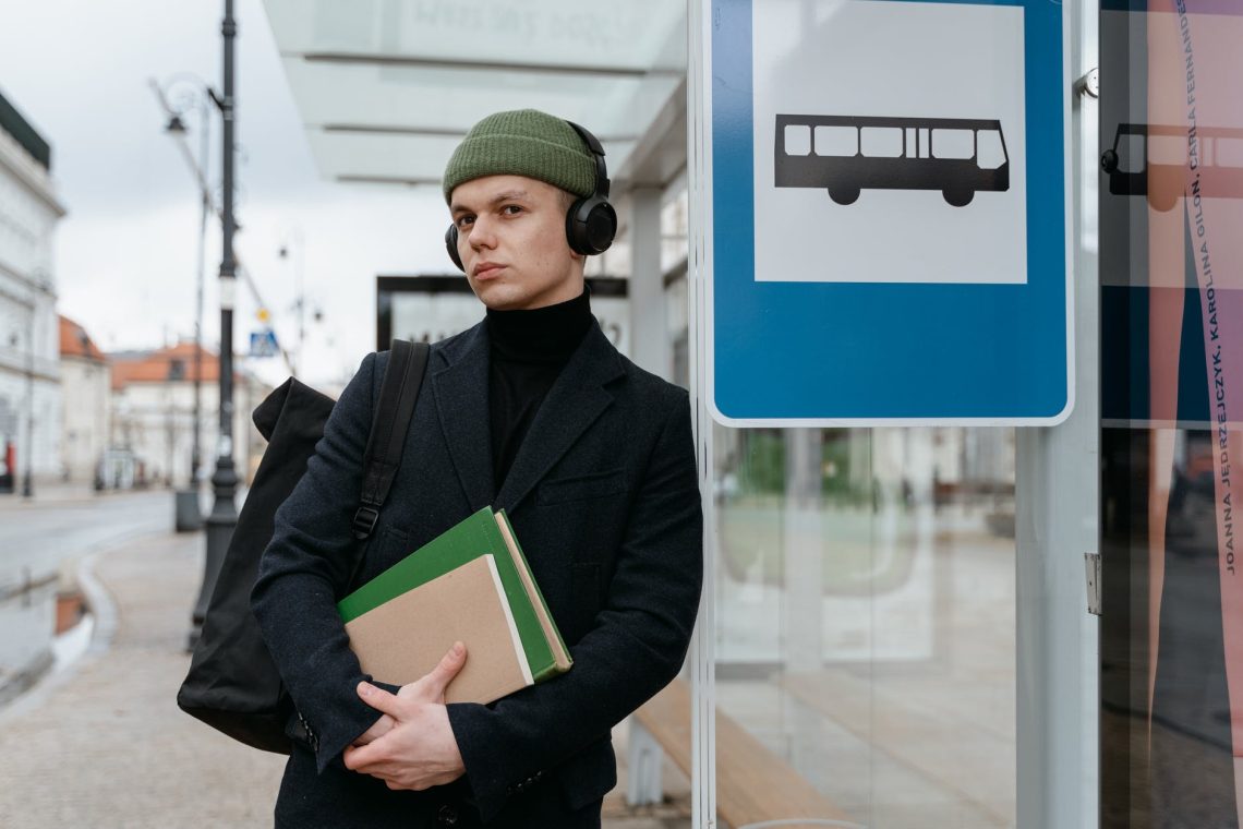 man waiting at the bus stop